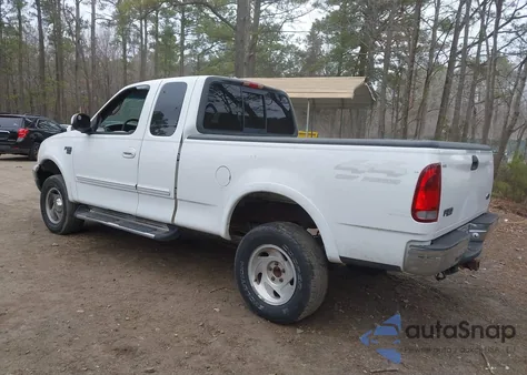 2000 Ford F-150 z USA, uszkodzony, nr VIN 1FTRX18L3YNA61333